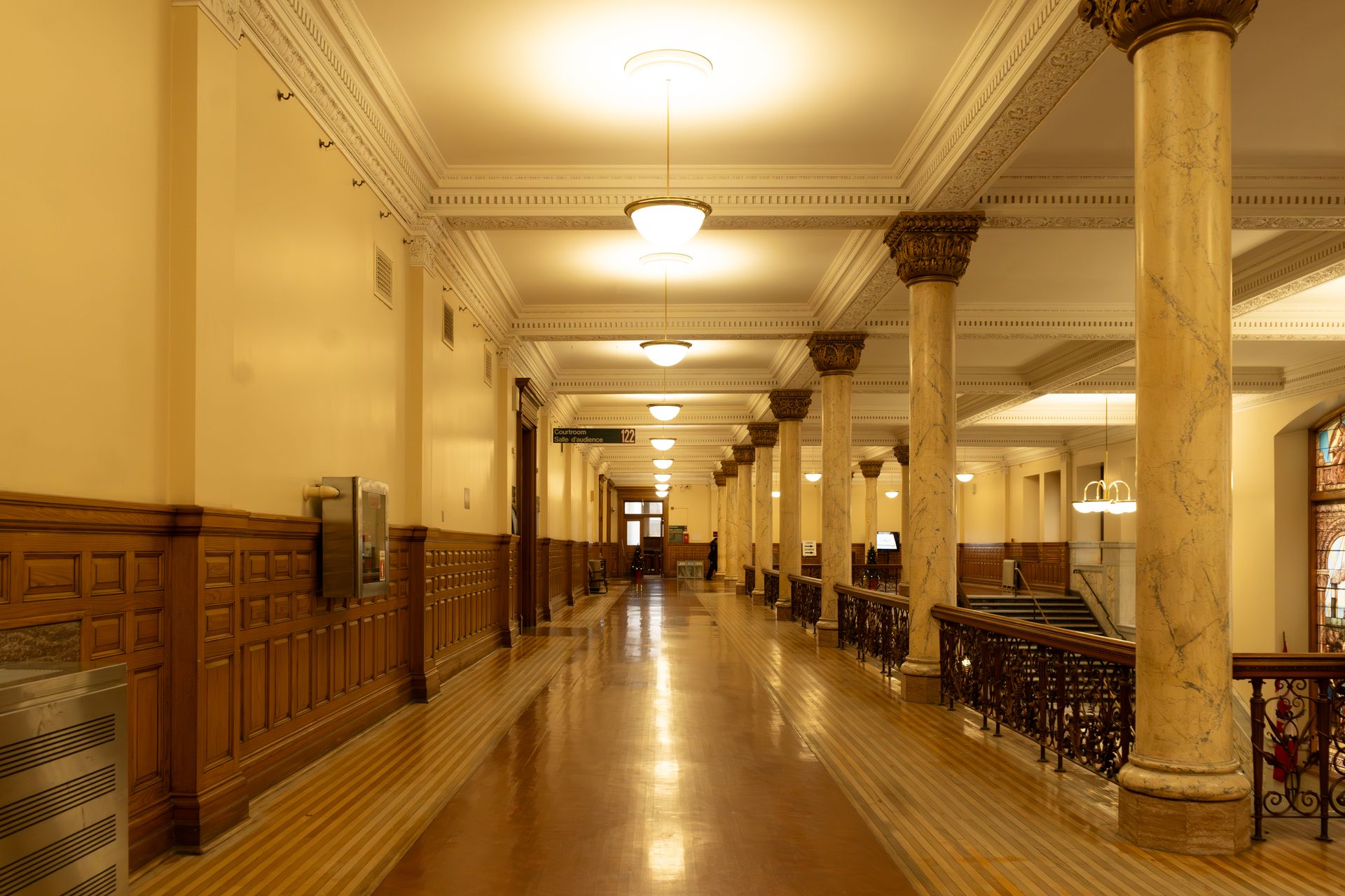 Marble-columned courthouse corridor